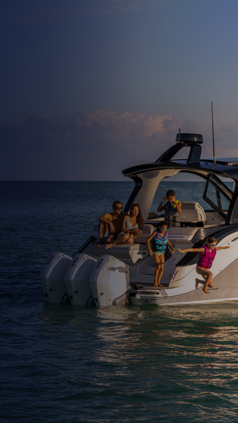 Family spending time on marine vehicle in the ocean.