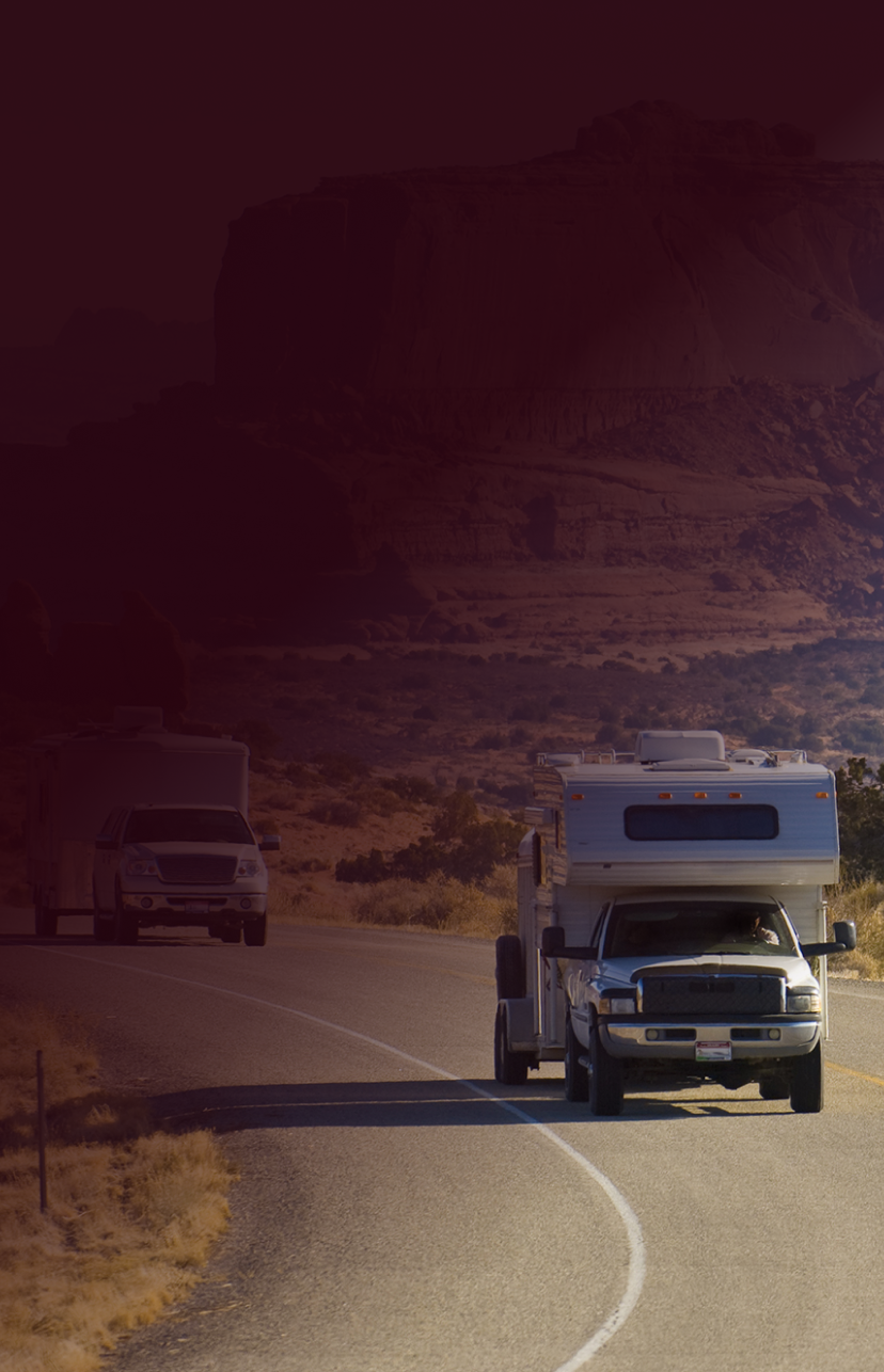 An RV driving on the open road.